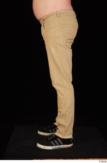 Spencer black sneakers brown trousers dressed leg lower body 0003.jpg